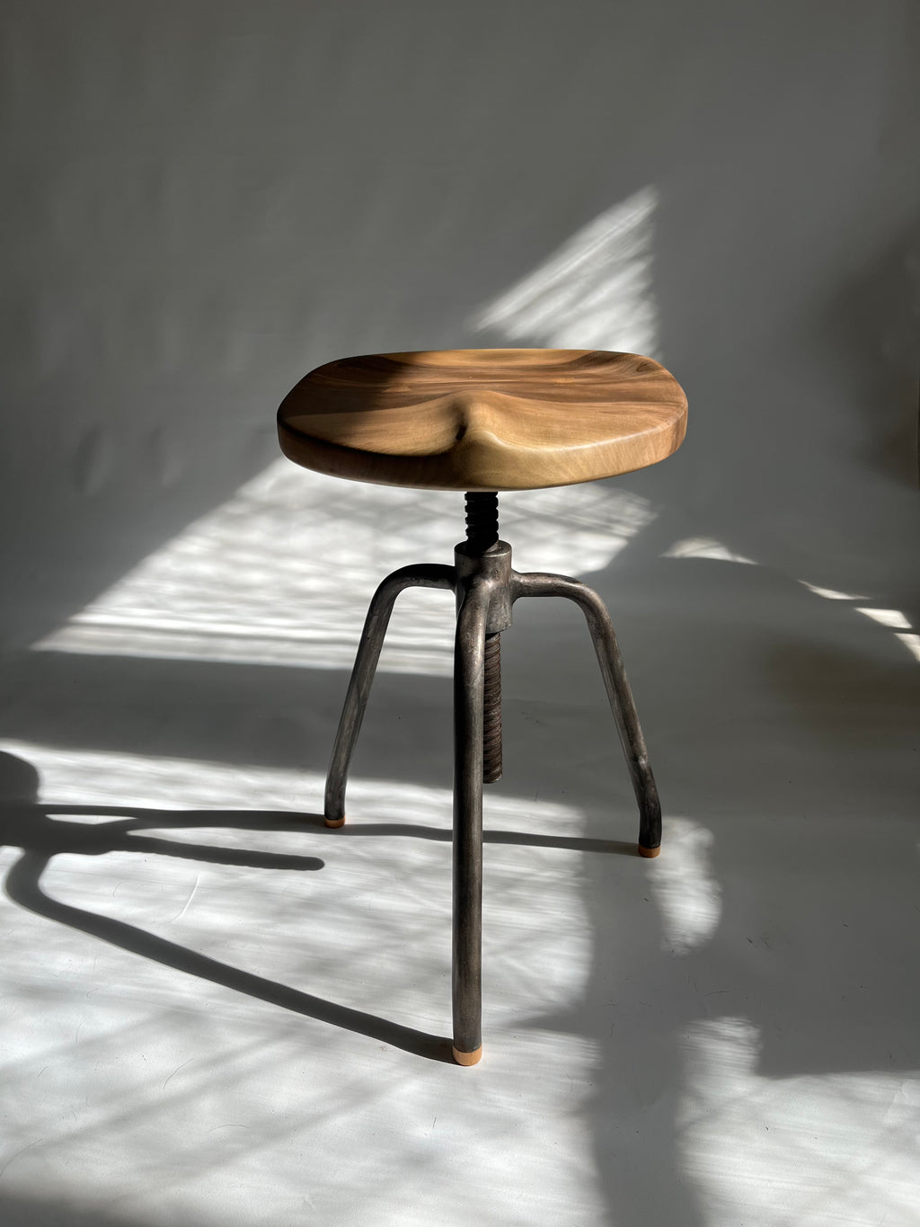 Walnut Carved Swivel Stool