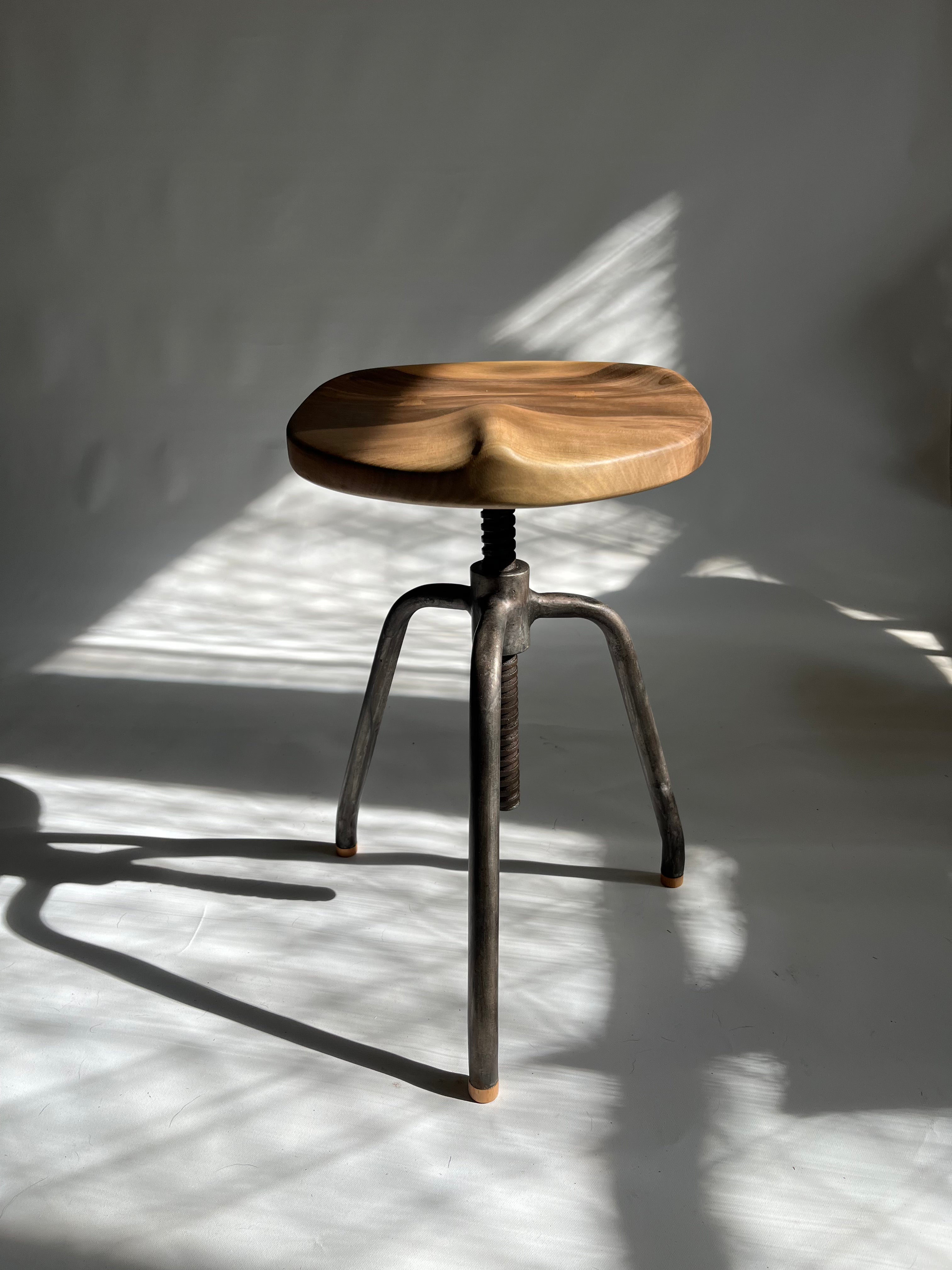 Walnut Carved Swivel Stool