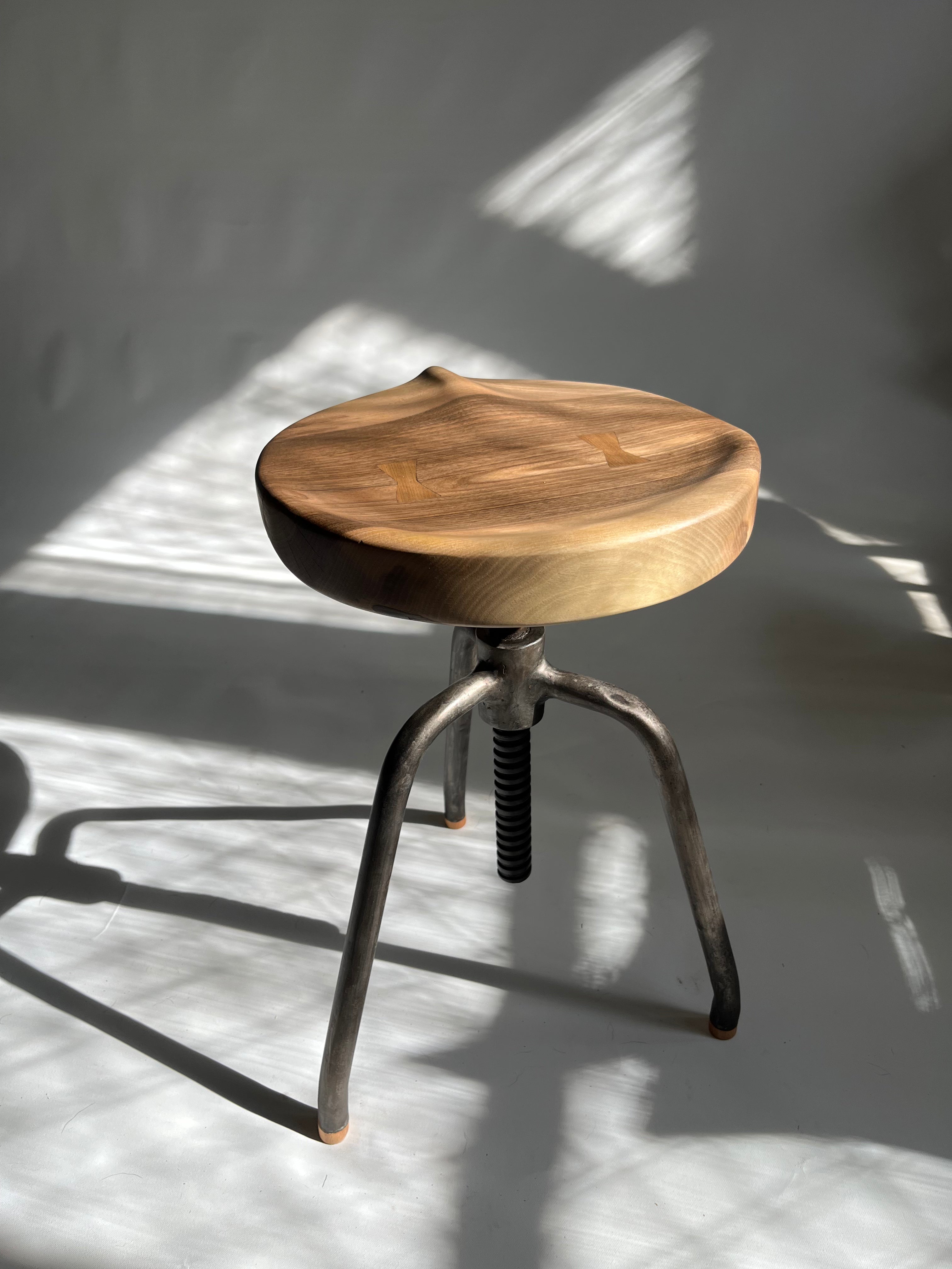 Walnut Carved Swivel Stool