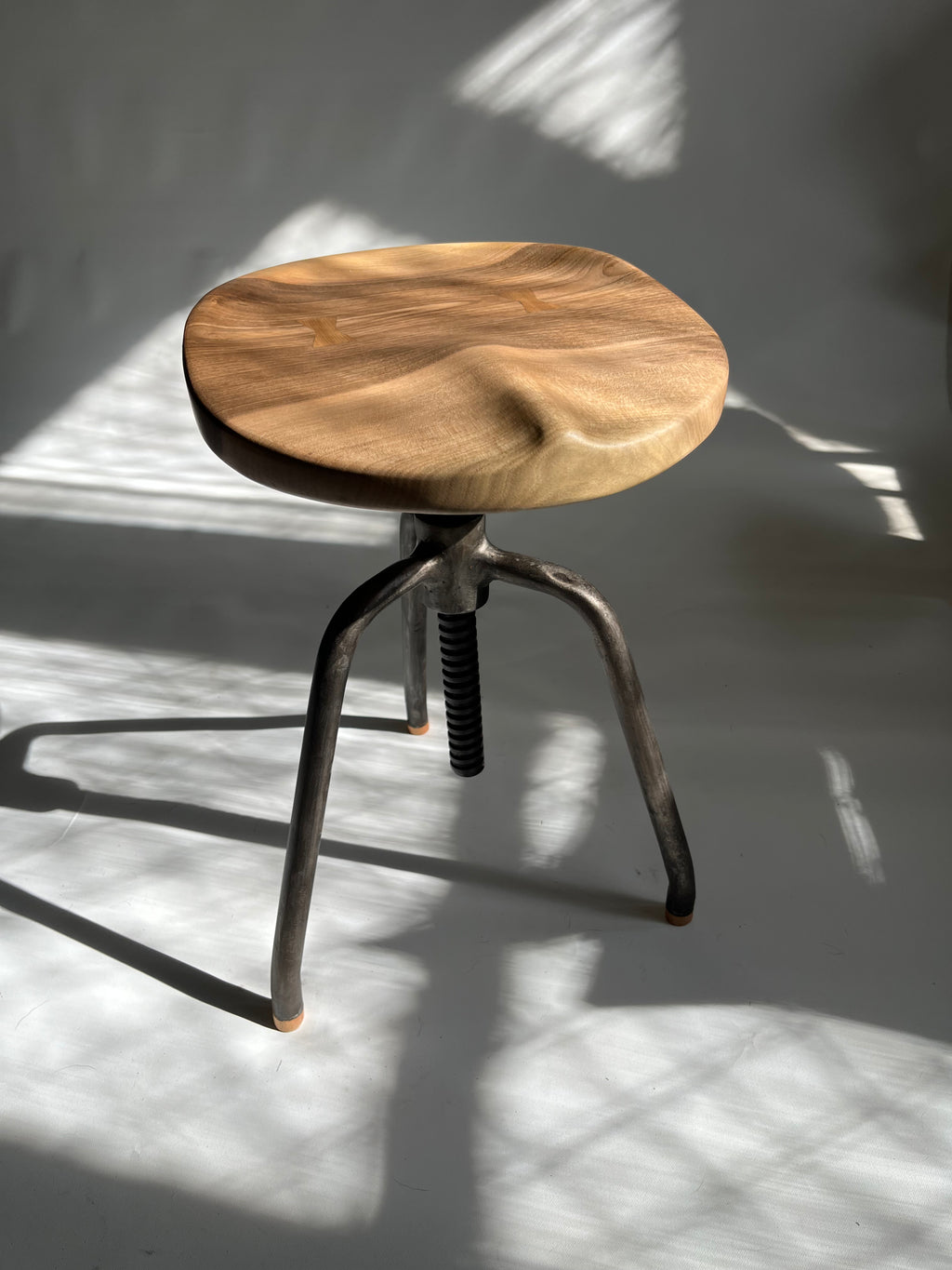 Walnut Carved Swivel Stool