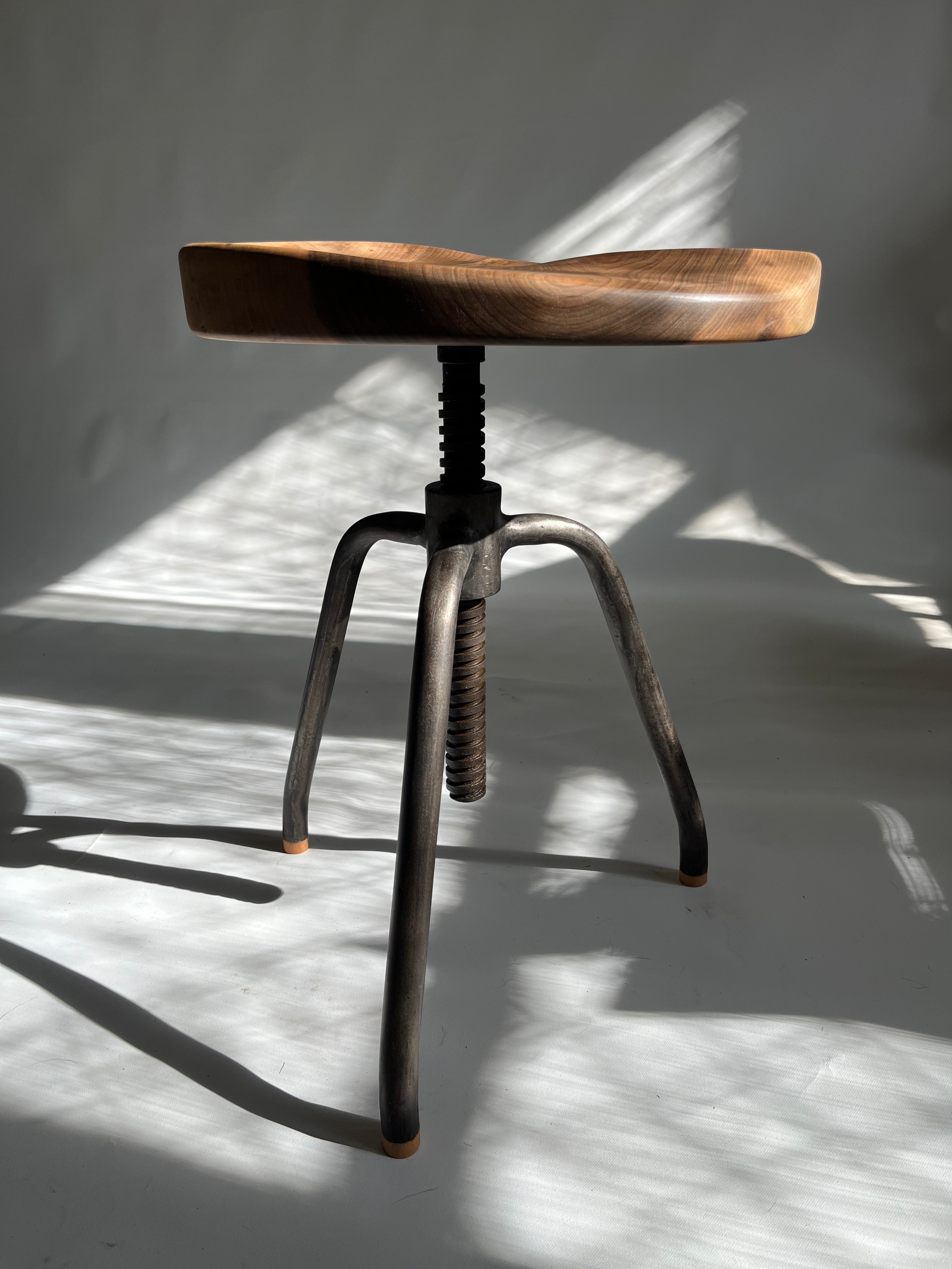 Walnut Carved Swivel Stool