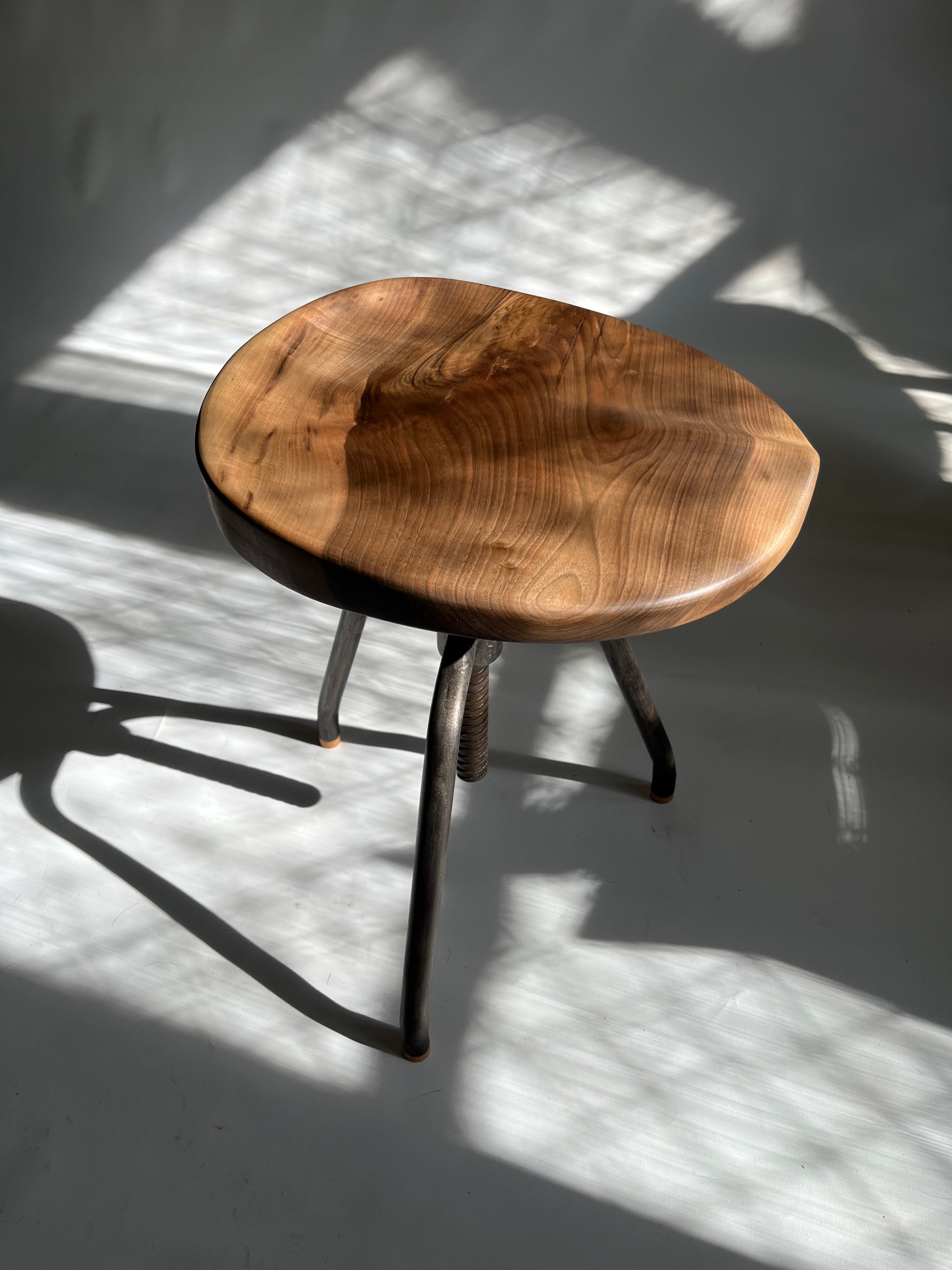 Walnut Carved Swivel Stool