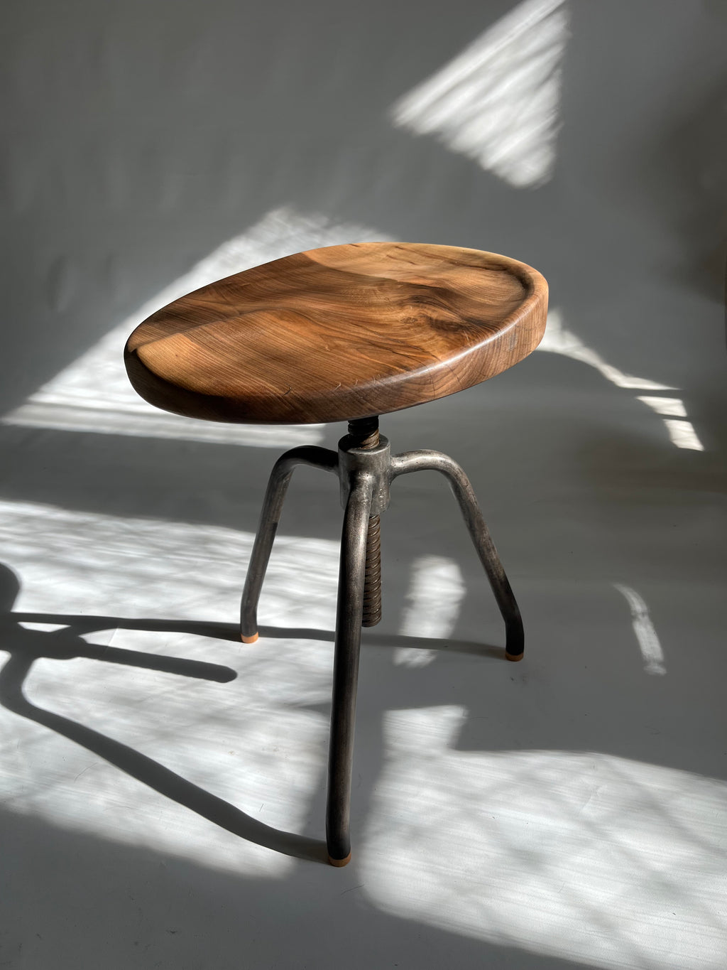 Walnut Carved Swivel Stool