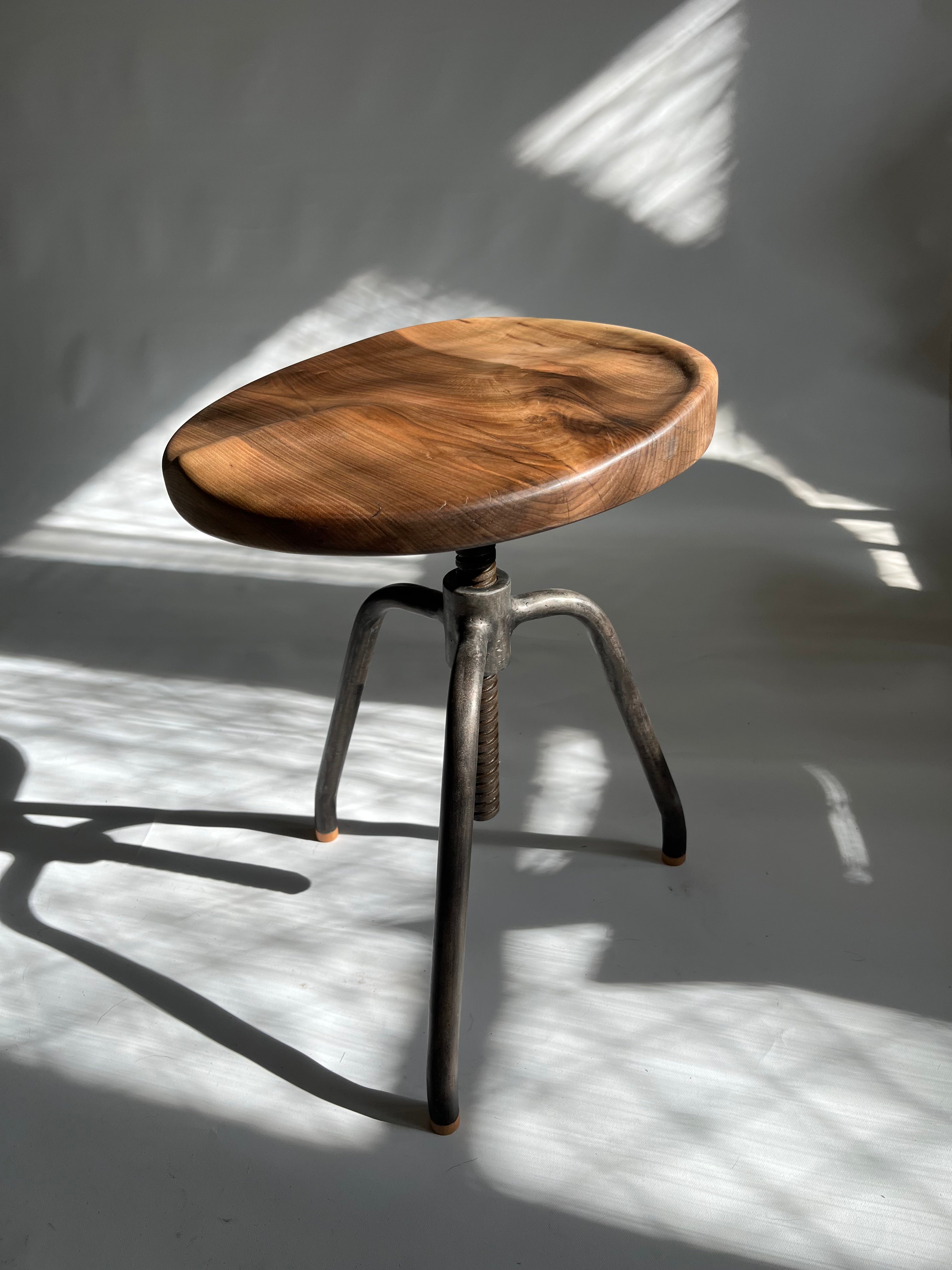 Walnut Carved Swivel Stool